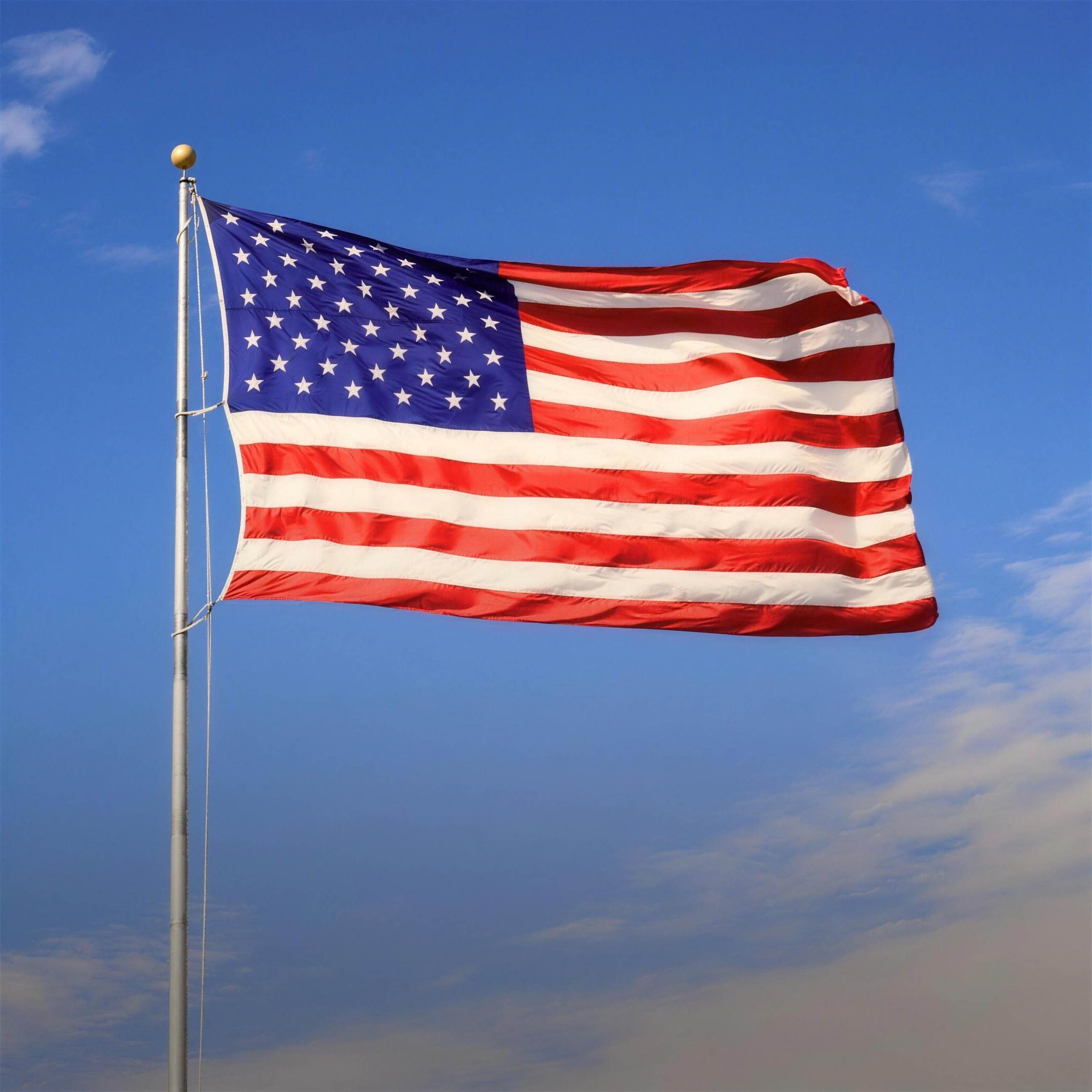 American flag against a blue sky