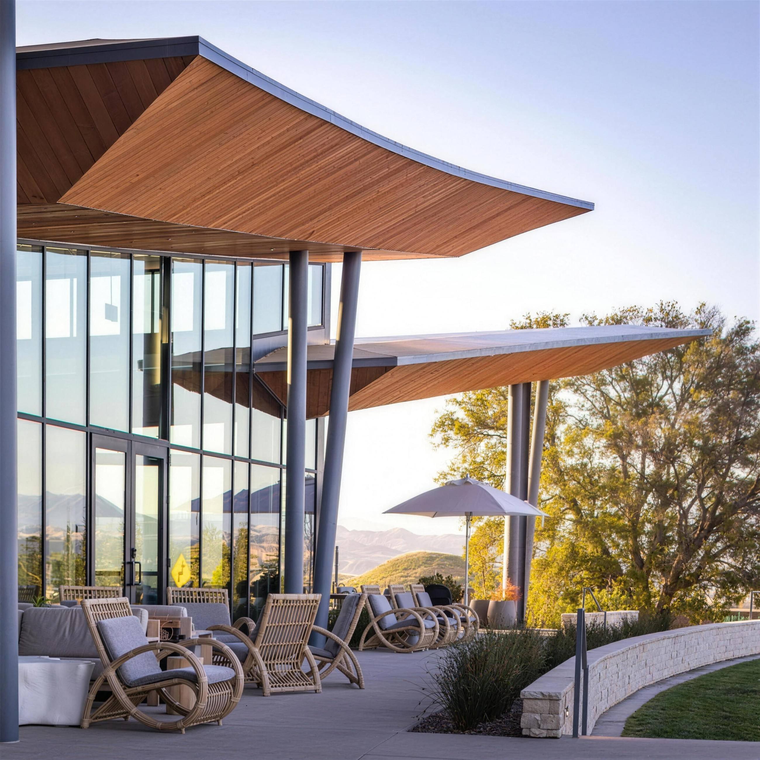 Modern terrace pavilion on a hillside at dusk