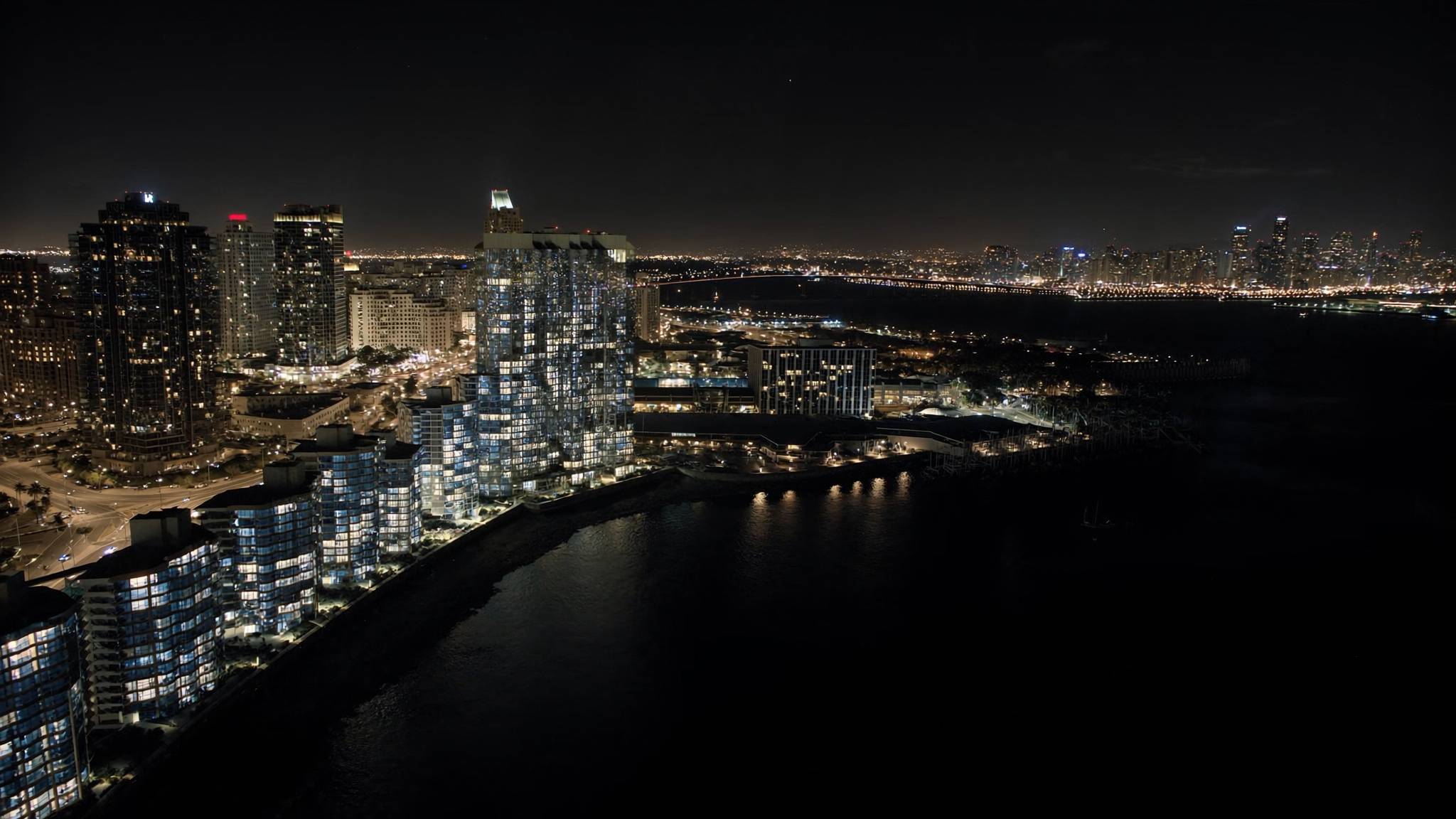 Aerial view of downtown San Diego and the bay at night