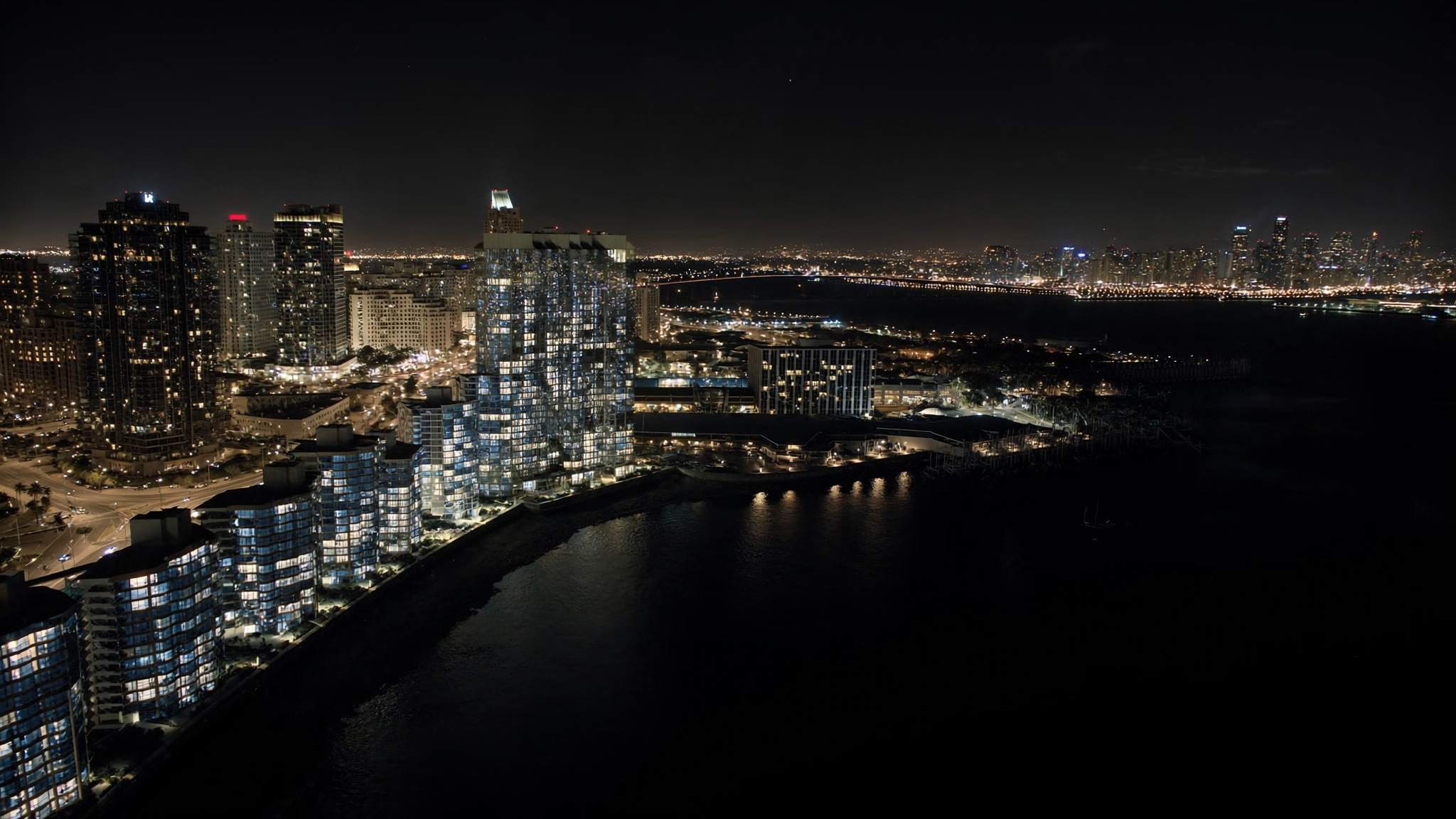 Aerial view of downtown San Diego and the bay at night
