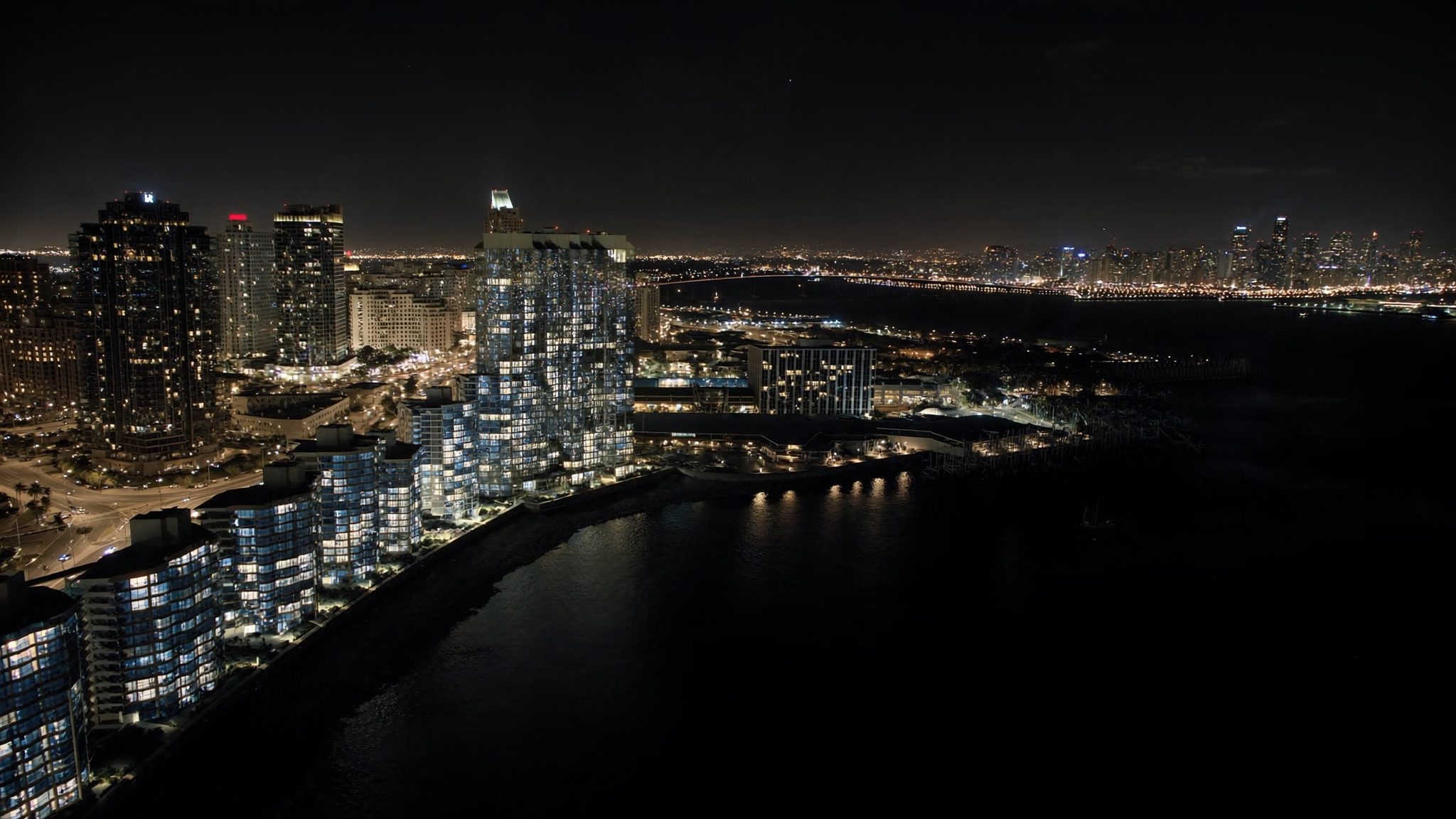 Aerial view of downtown San Diego and the bay at night